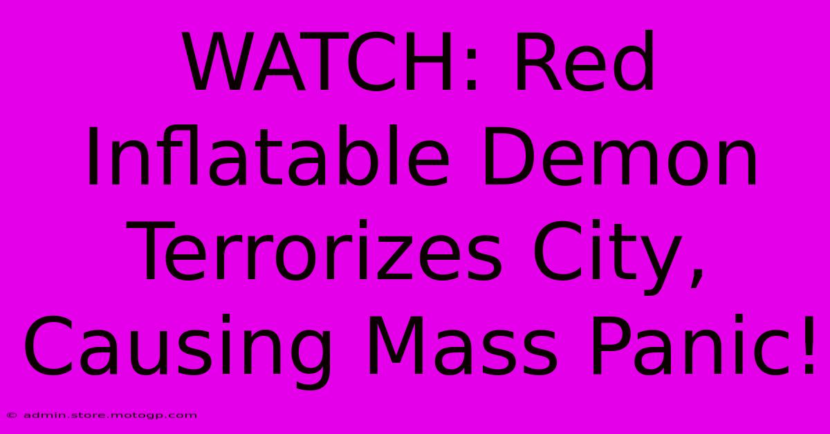 WATCH: Red Inflatable Demon Terrorizes City, Causing Mass Panic!